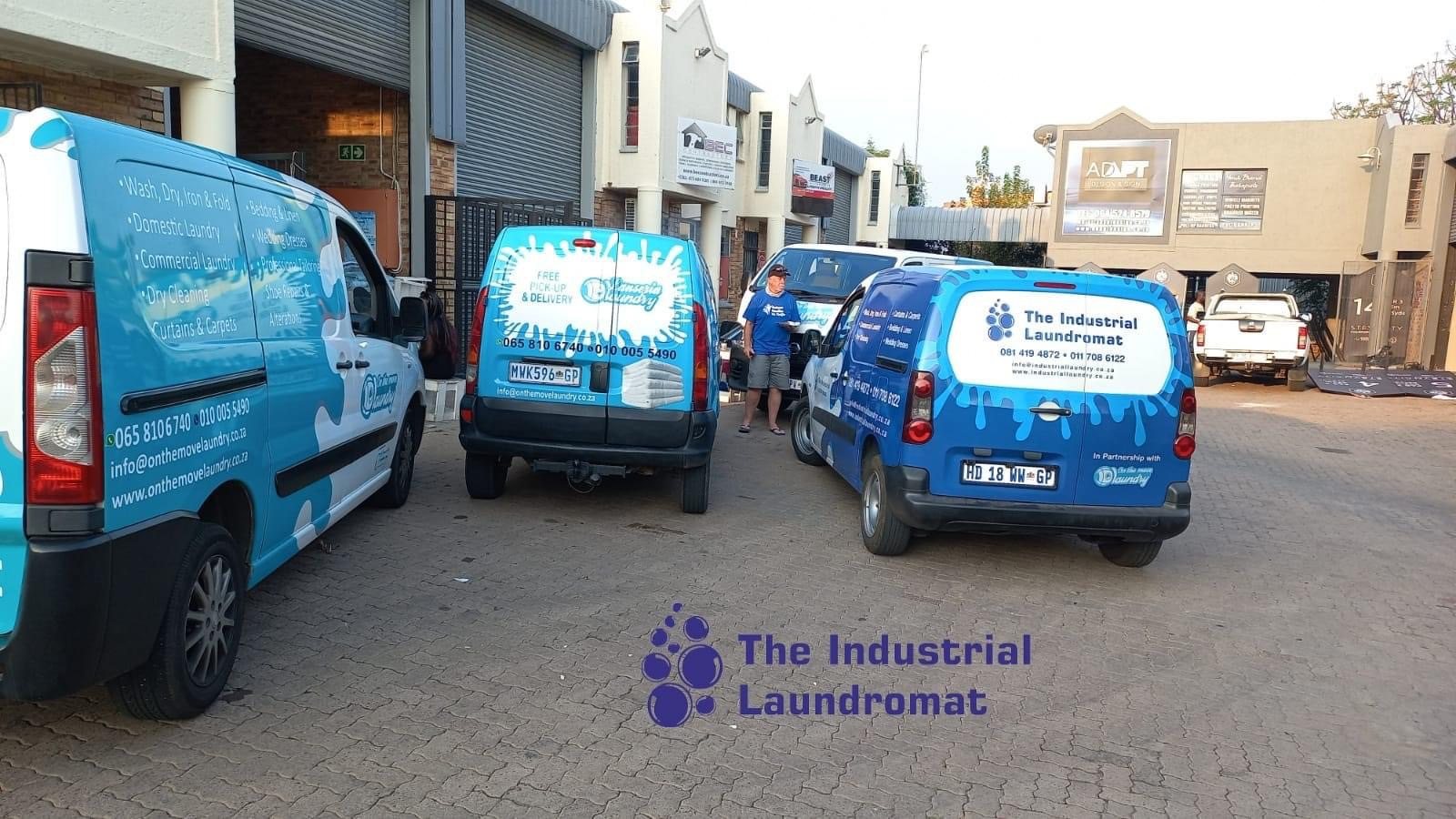 Industrial Laundromat delivery fleet outside the facility